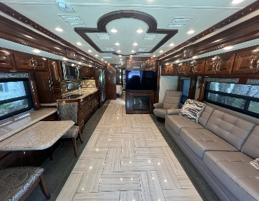Luxury, comfort, and the feeling of home travel with you in this diesel pusher with heated tile floors and lots of open space