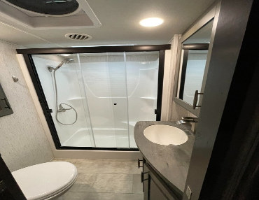 5th wheel RV has two full bathrooms that have been customized