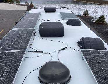 5th Wheel RV has 1200 watts of solar panels to accompany 5500 watt Onan generator